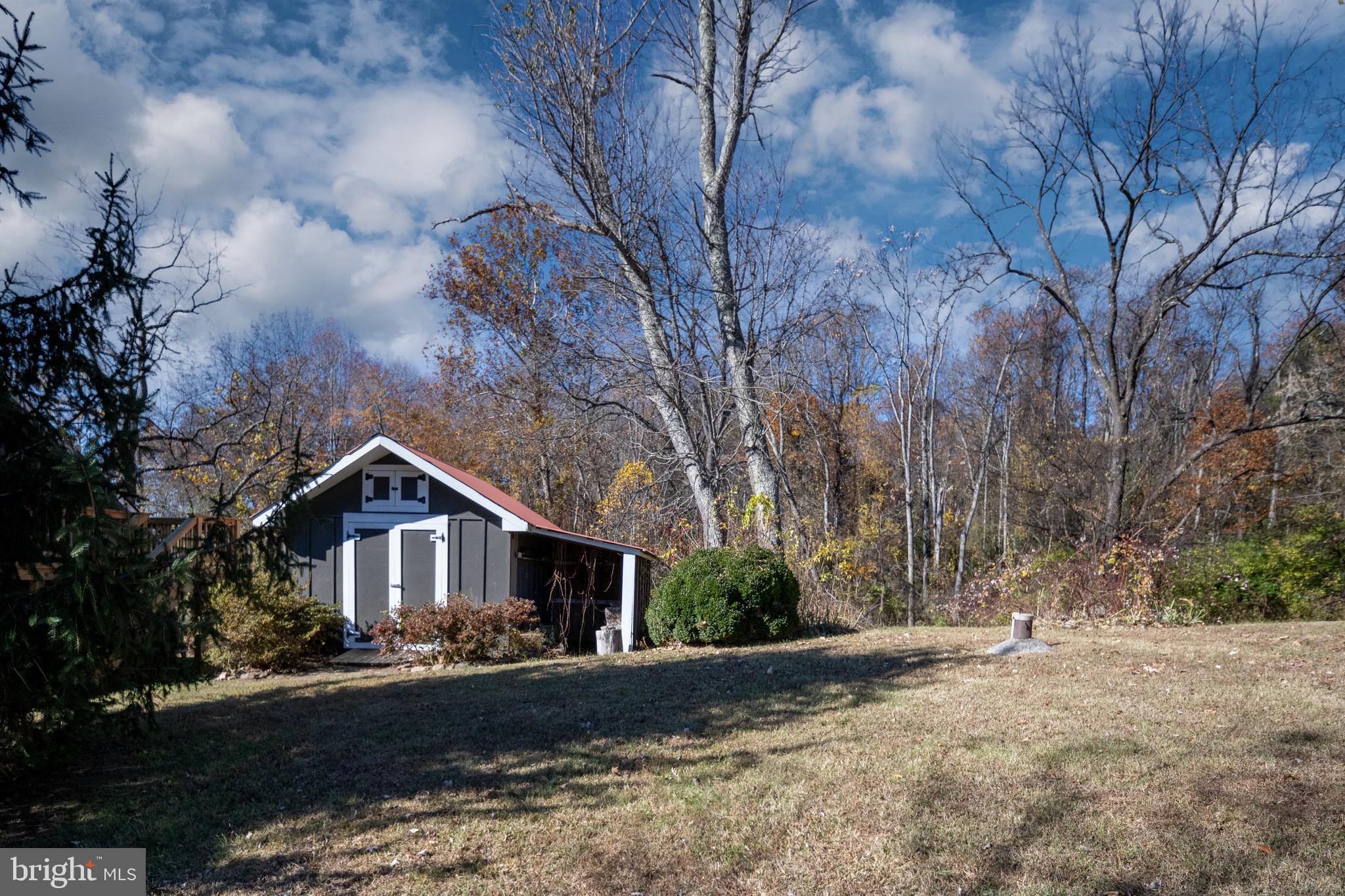 560 Richmond Road Amissville, VA 20106 - Photo 126 of 133 a front view of a house with yard and parking