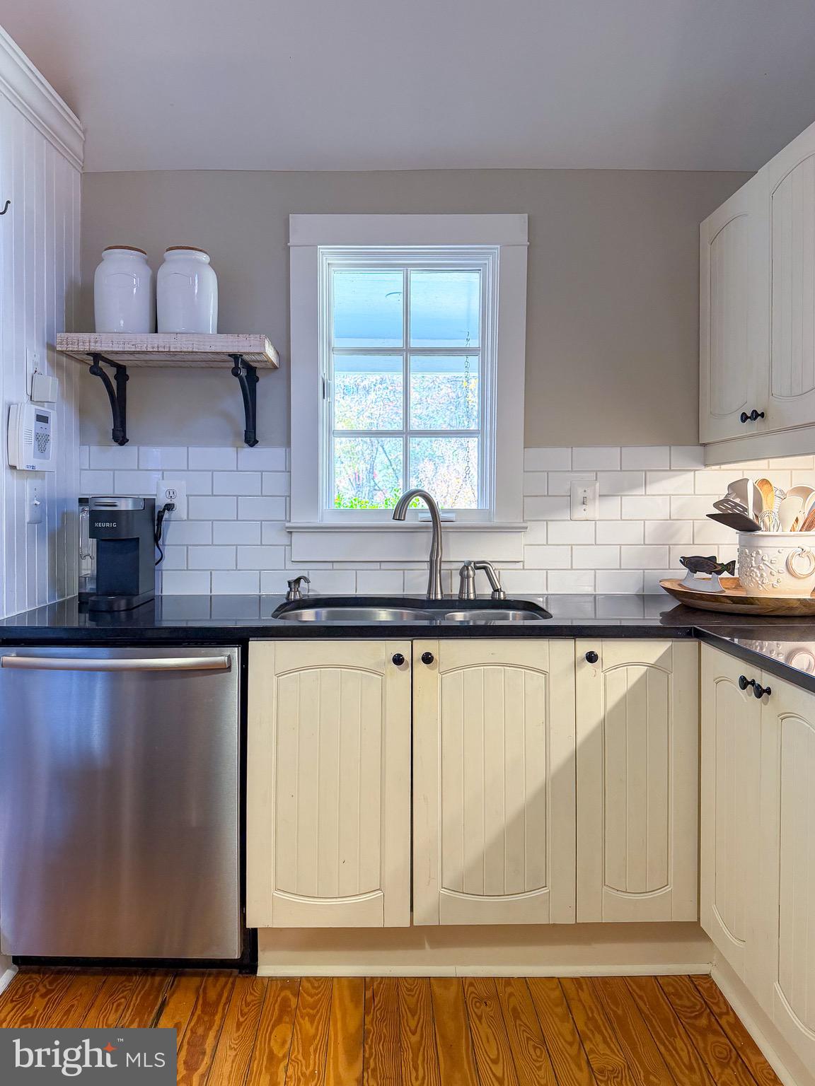 560 Richmond Road Amissville, VA 20106 - Photo 24 of 133 a kitchen with stainless steel appliances granite countertop a sink and a stove