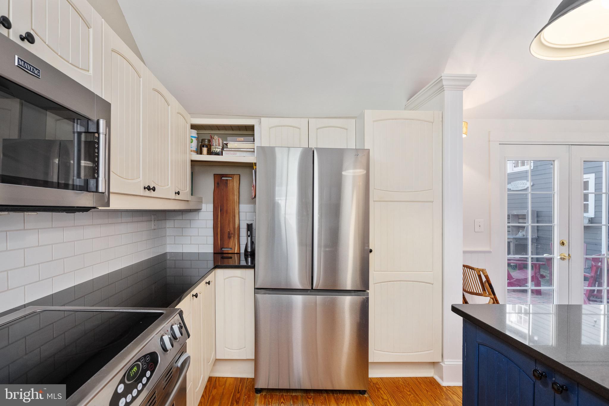 560 Richmond Road Amissville, VA 20106 - Photo 31 of 133 a kitchen with stainless steel appliances a refrigerator sink and microwave