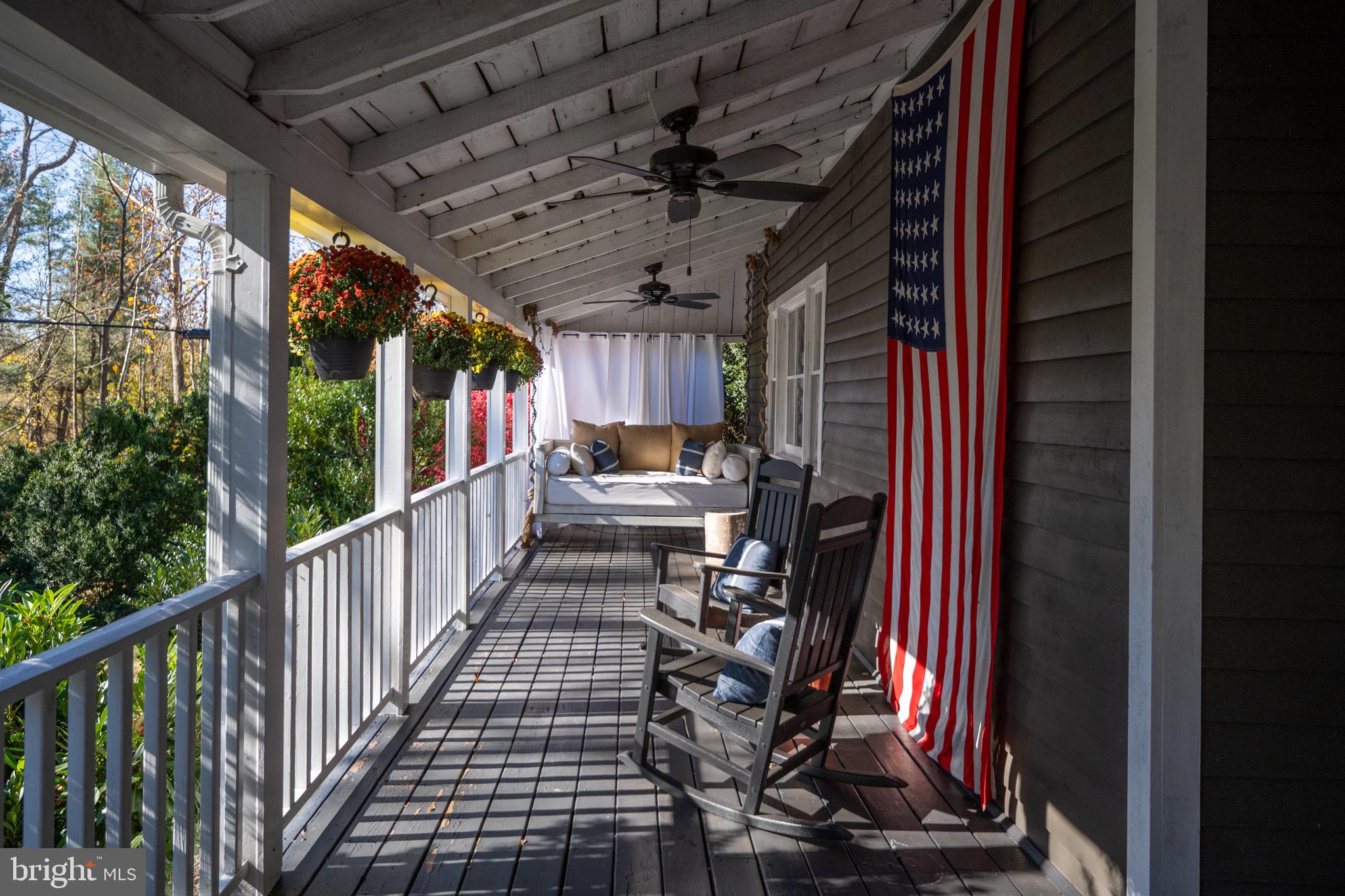 560 Richmond Road Amissville, VA 20106 - Photo 5 of 133 a view of a porch with wooden floor