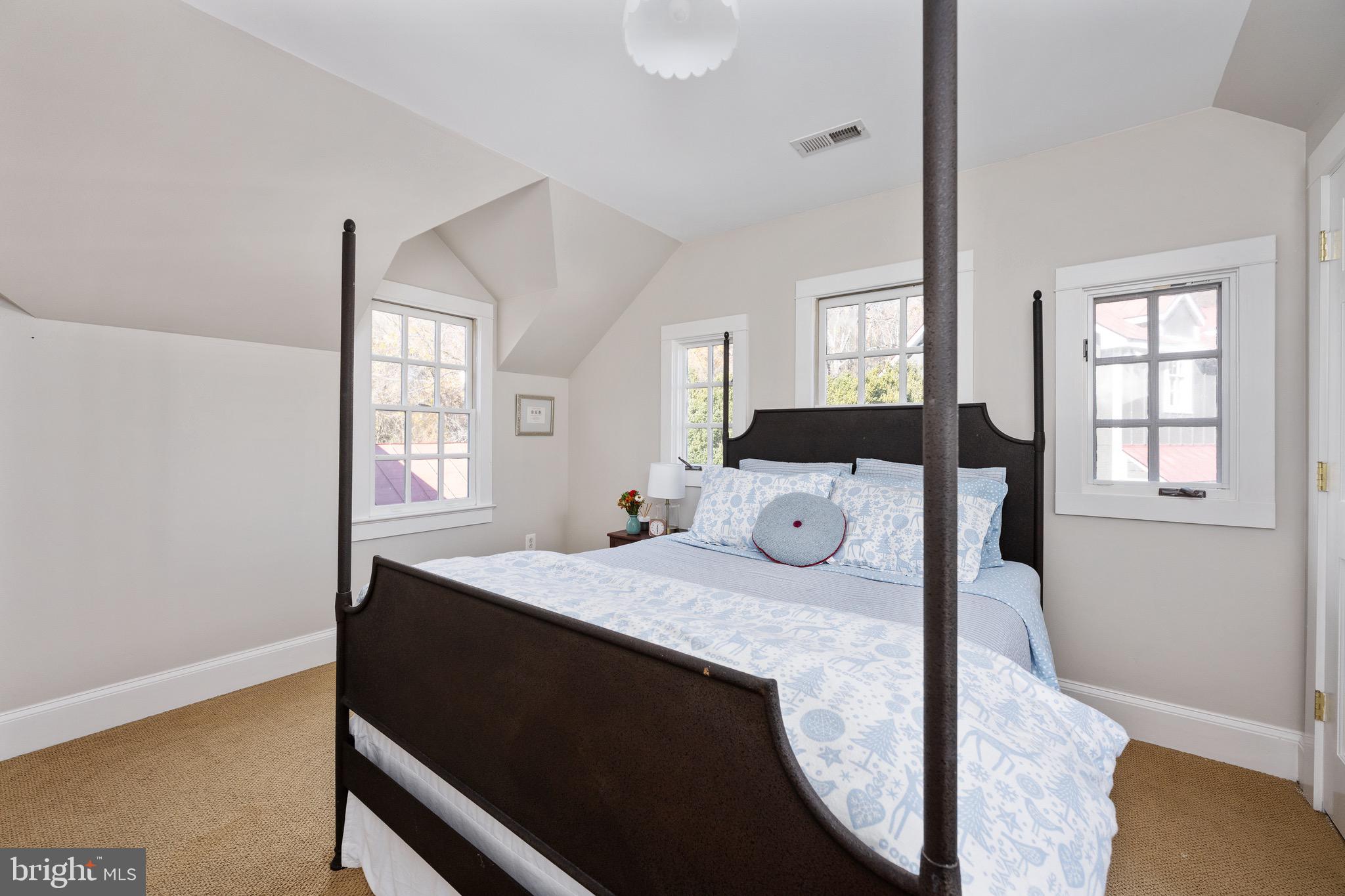560 Richmond Road Amissville, VA 20106 - Photo 71 of 133 a bedroom with a bed and wooden floor