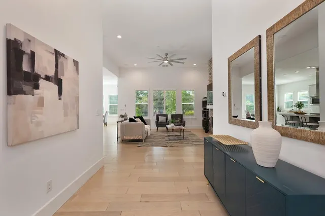 a kitchen with a sink stainless steel appliances and cabinets