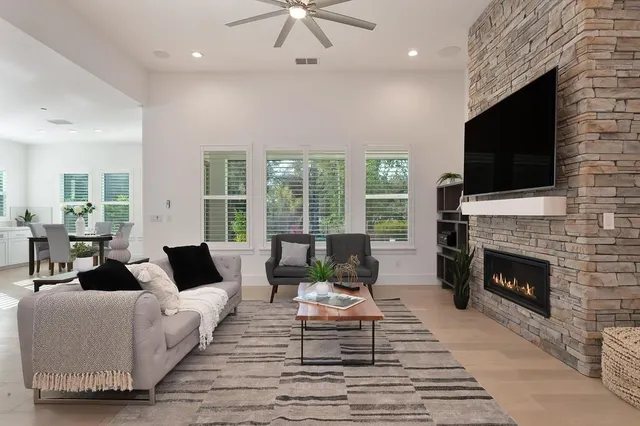 a kitchen with counter top space cabinets and appliances