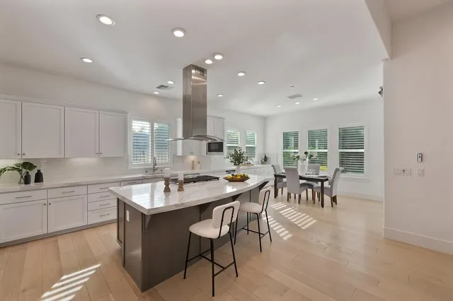 a view of a porch with furniture and garden