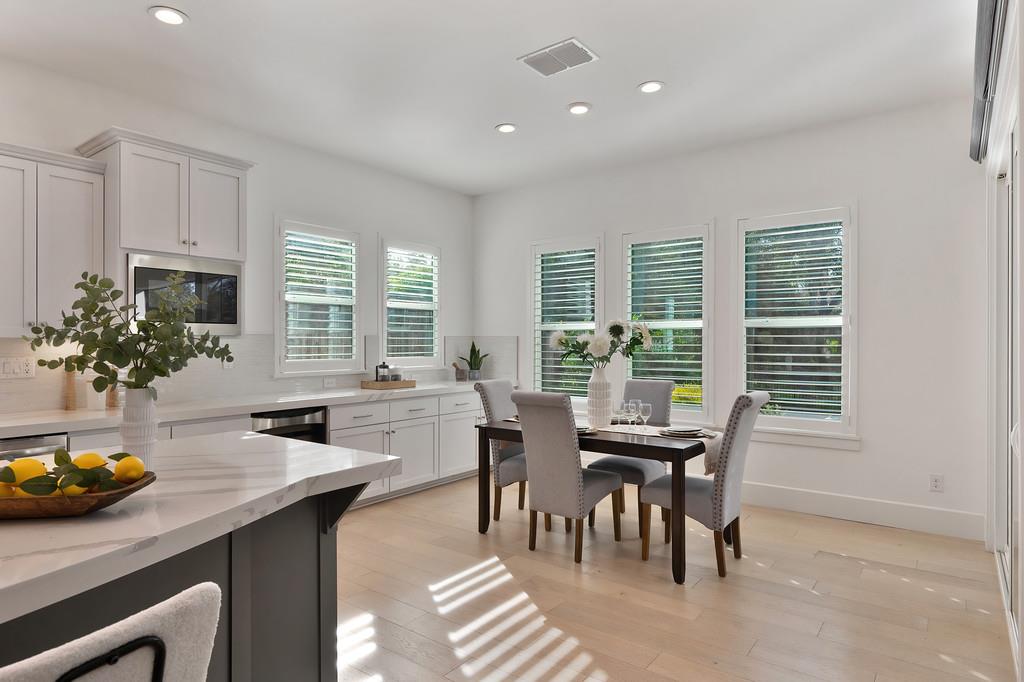 5855 Tree Swallow Circle Rocklin, CA 95677 - Photo 22 of 72 a dining room with furniture and window