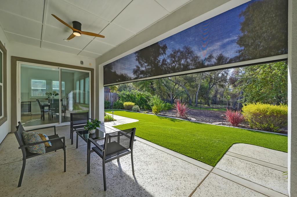 5855 Tree Swallow Circle Rocklin, CA 95677 - Photo 25 of 72 a view of a porch with furniture and garden