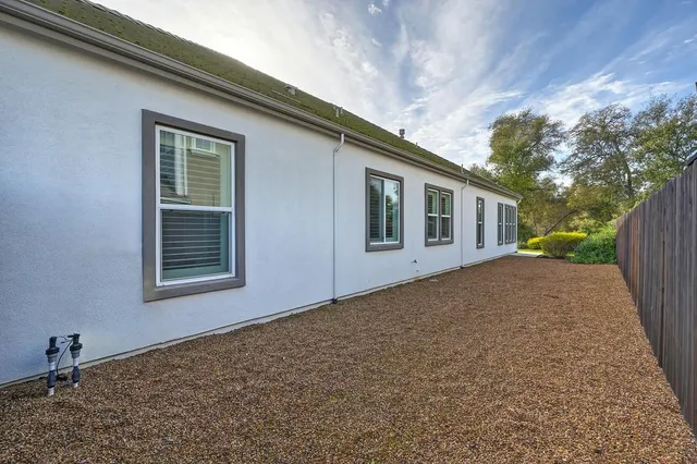 a bathroom with a double vanity sink and mirror