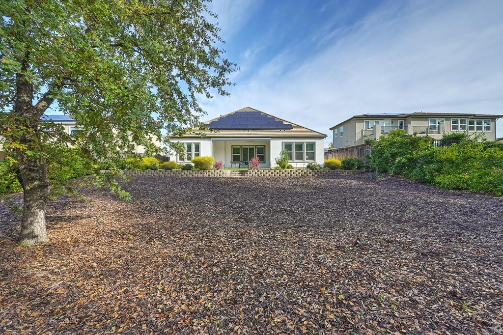 5855 Tree Swallow Circle Rocklin, CA 95677 - Photo 35 of 72 a front view of a house with a yard