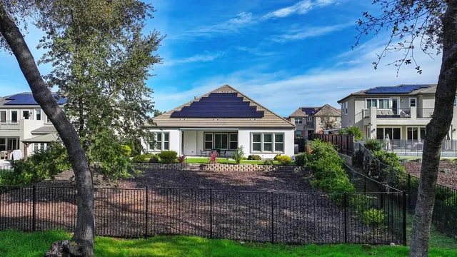 a bedroom with a bed and a chair