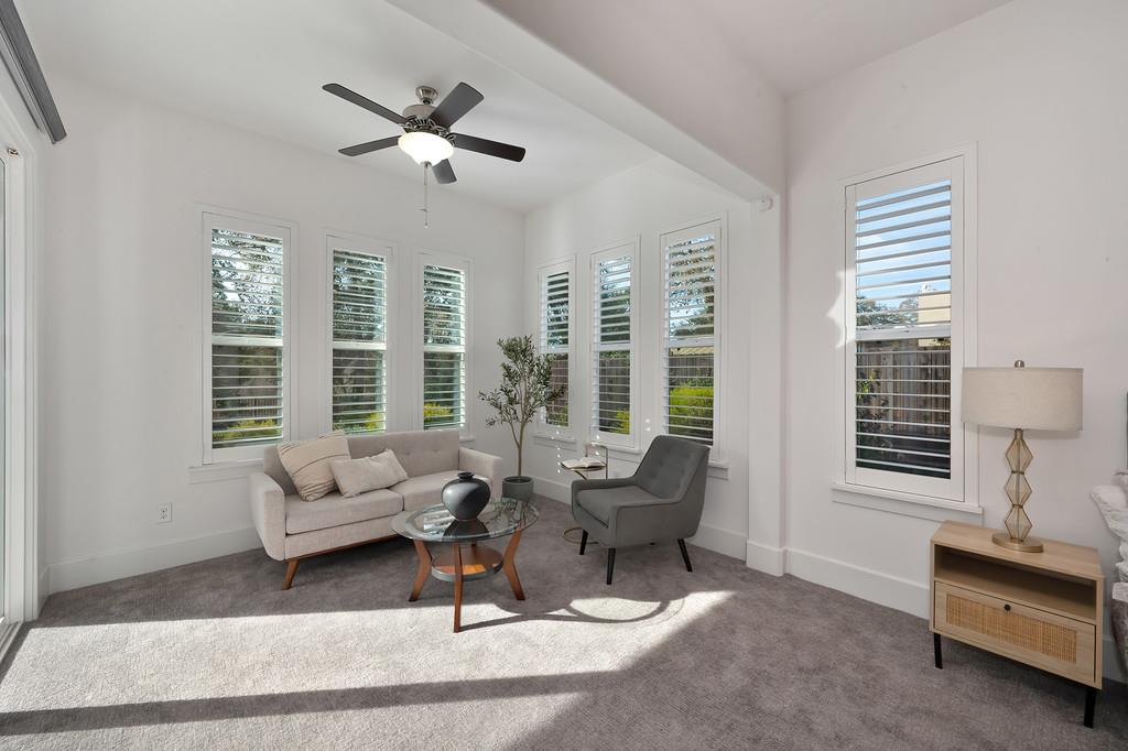 5855 Tree Swallow Circle Rocklin, CA 95677 - Photo 39 of 72 a living room with furniture and windows