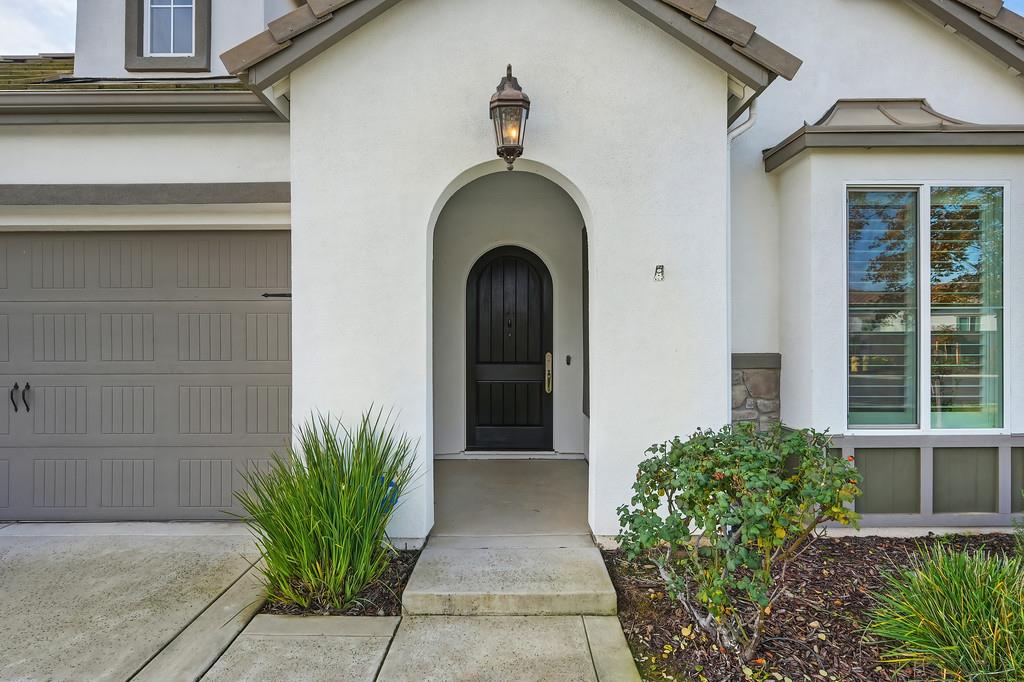 5855 Tree Swallow Circle Rocklin, CA 95677 - Photo 5 of 72 a view of a entryway door of the house