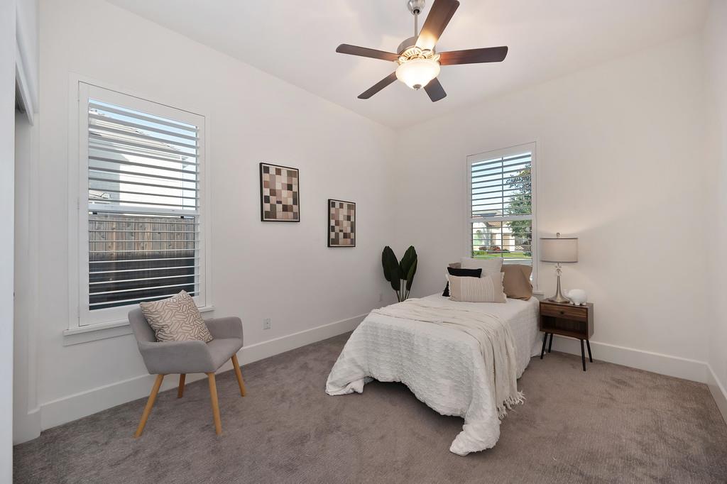 5855 Tree Swallow Circle Rocklin, CA 95677 - Photo 54 of 72 a bedroom with a bed and a window