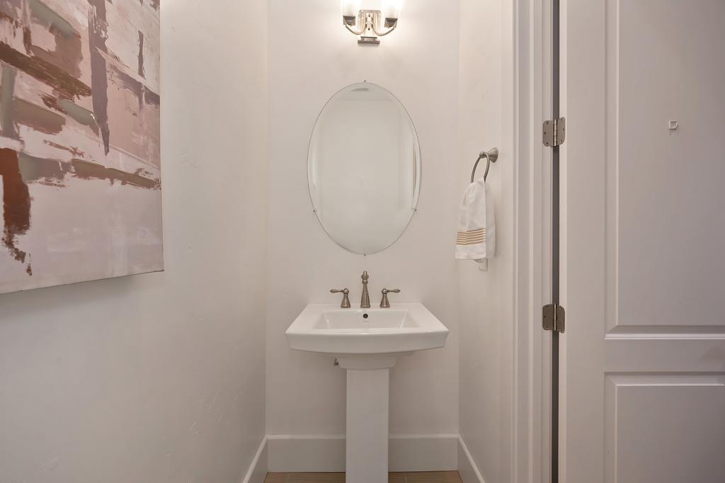 5855 Tree Swallow Circle Rocklin, CA 95677 - Photo 59 of 72 a bathroom with a sink and a mirror