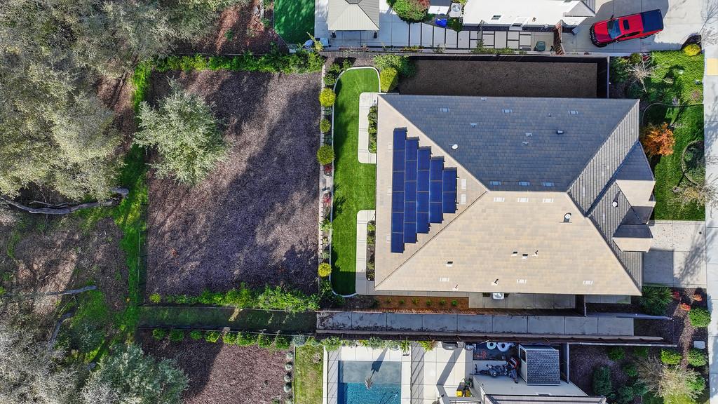 5855 Tree Swallow Circle Rocklin, CA 95677 - Photo 65 of 72 an aerial view of a house with a yard and balcony