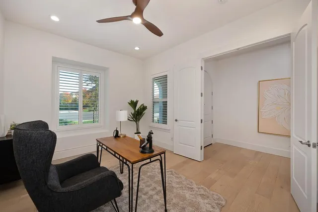 a kitchen with counter space dining table and chairs