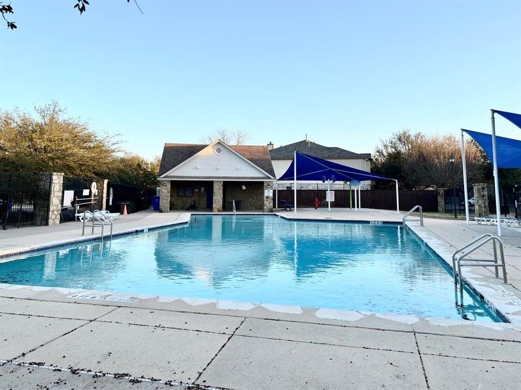 2409 Romeo Drive Cedar Park, TX 78613 - Photo 19 of 22 a view of a house with pool