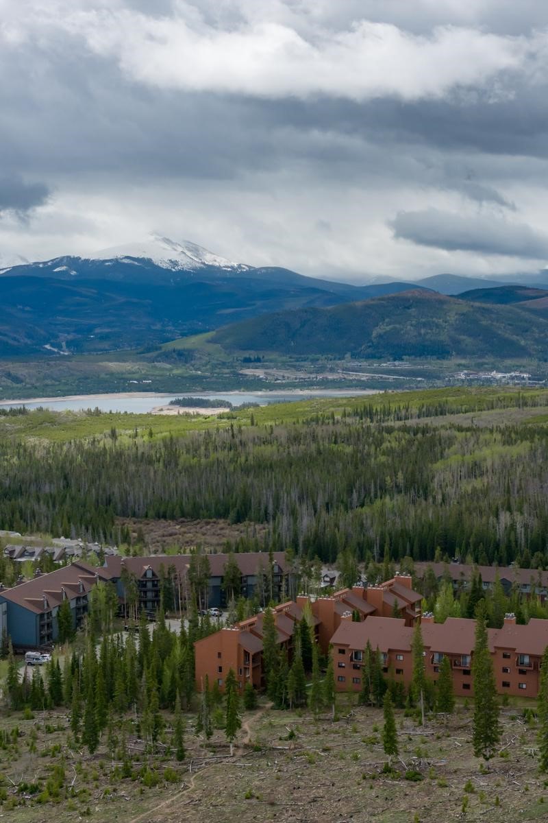 91100 Ryan Gulch Road, Unit 91105 Silverthorne, CO 80498 - Photo 34 of 49 a view of lake and mountain view