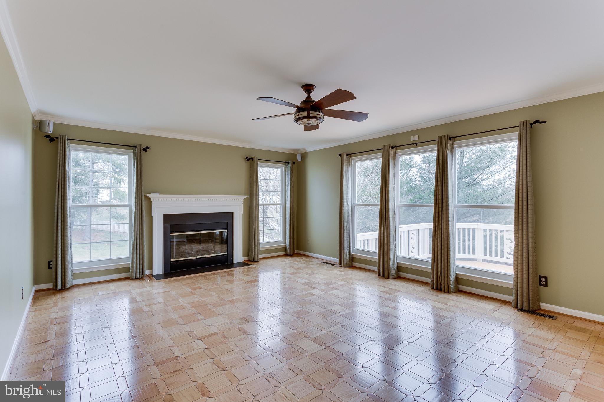 8001 Folkstone Road Manassas, VA 20111 - Photo 14 of 40 Family room with fireplace