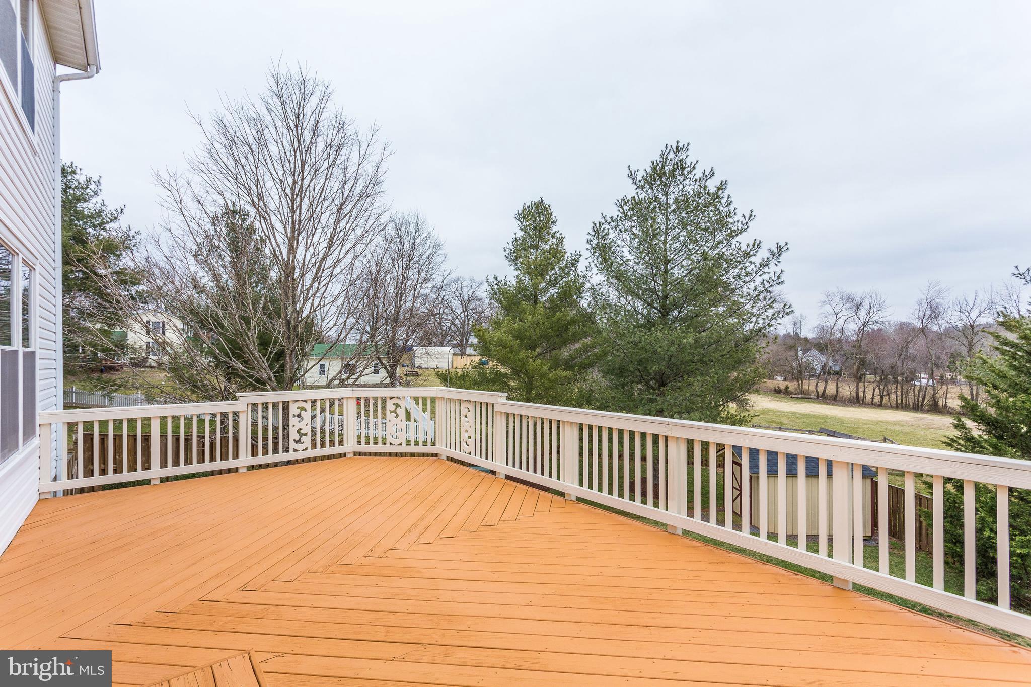 8001 Folkstone Road Manassas, VA 20111 - Photo 35 of 40 Large deck with nice views