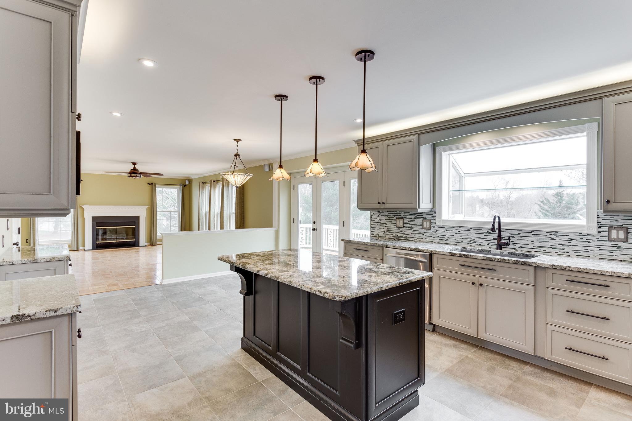 8001 Folkstone Road Manassas, VA 20111 - Photo 7 of 40 2-toned island with sconces