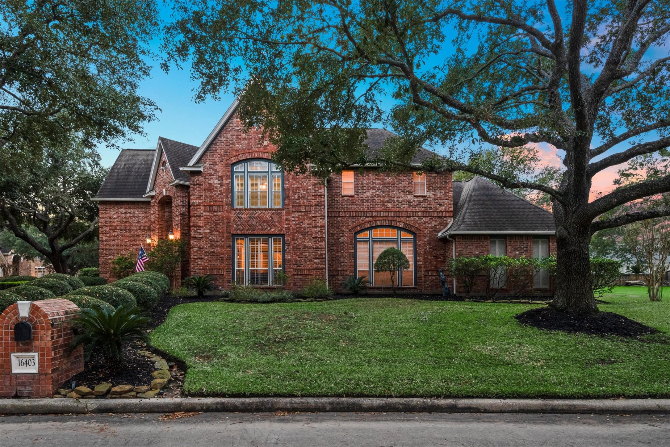 16403 Agusta Court Spring, TX 77379 - Photo 30 of 36 a front view of a house with garden