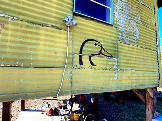 a view of a swimming pool with a seating area