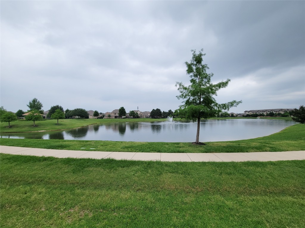 9706 Kirkstone Terrace Drive Spring, TX 77379 - Photo 45 of 46 residents enjoy the walking path around the lake in this gated community