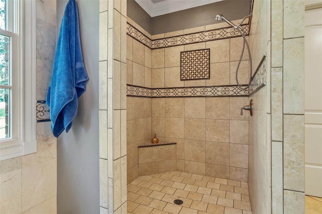 535 Riata Road Bullard, TX 75757 - Photo 17 of 40 a bathroom with a shower