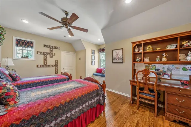 a bedroom with a bed and furniture