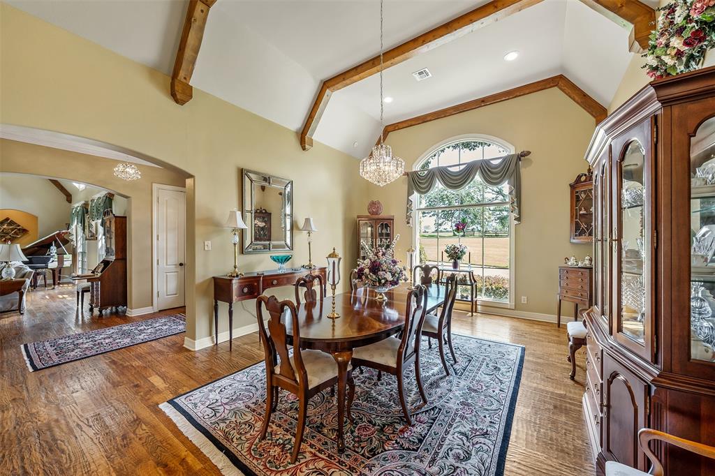 535 Riata Road Bullard, TX 75757 - Photo 6 of 40 a view of a dining room with furniture window and wooden floor