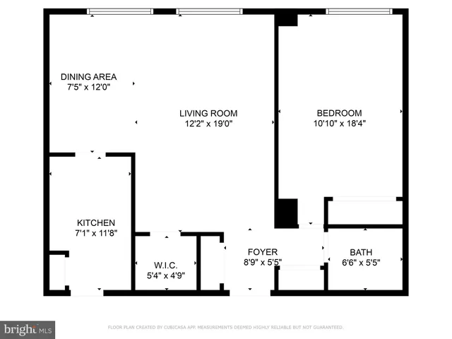 a bathroom with a shower and a window