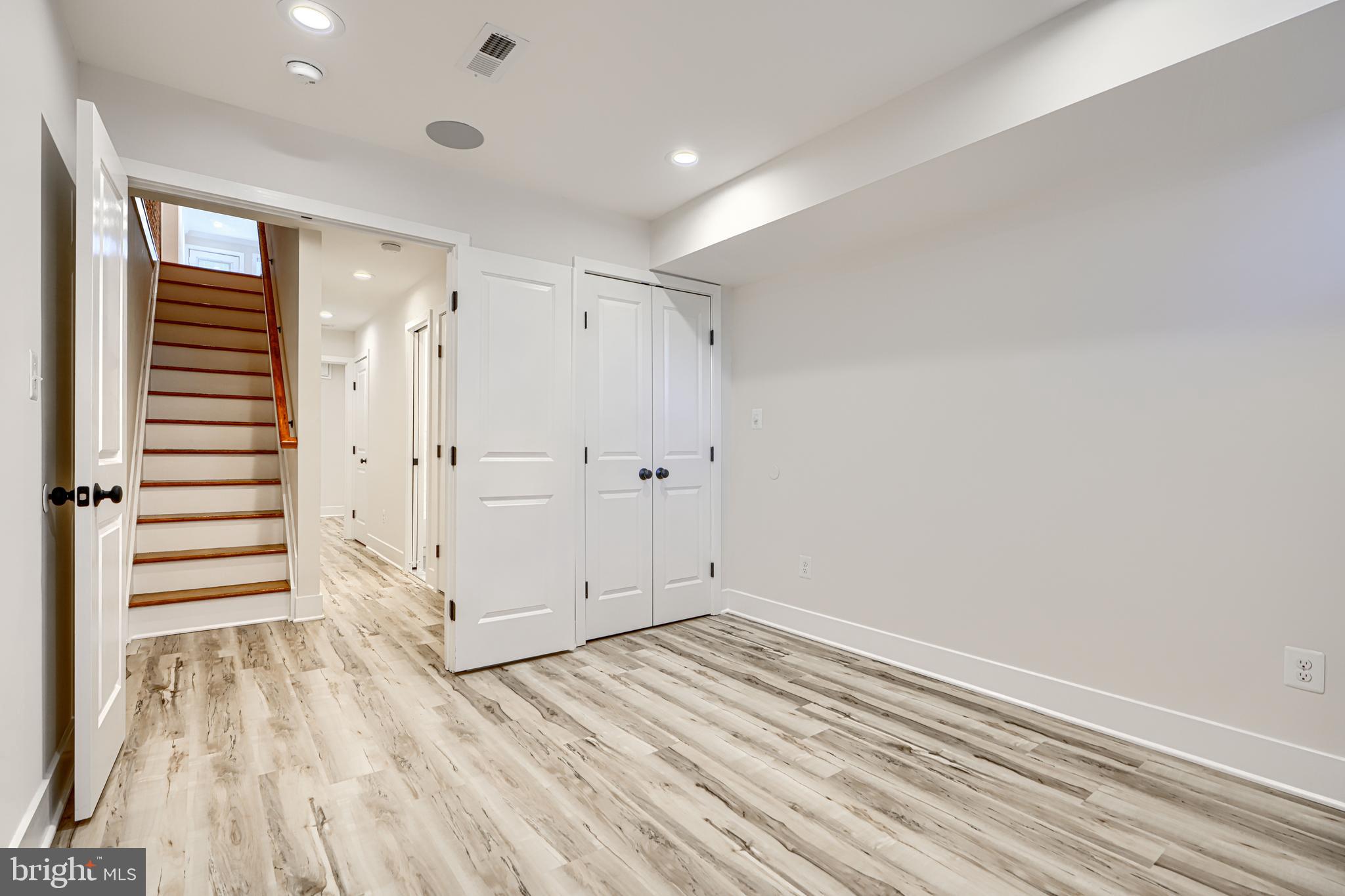 1427 Patapsco Street Baltimore, MD 21230 - Photo 16 of 34 wooden floor in an empty room