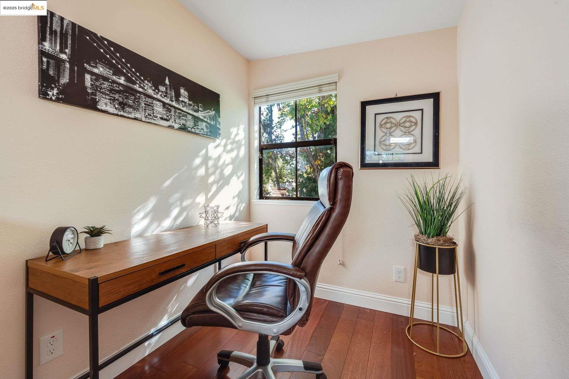 2316 Blake Street, Unit D Berkeley, CA 94704 - Photo 25 of 31 Office area with dark wood-style floors and baseboards