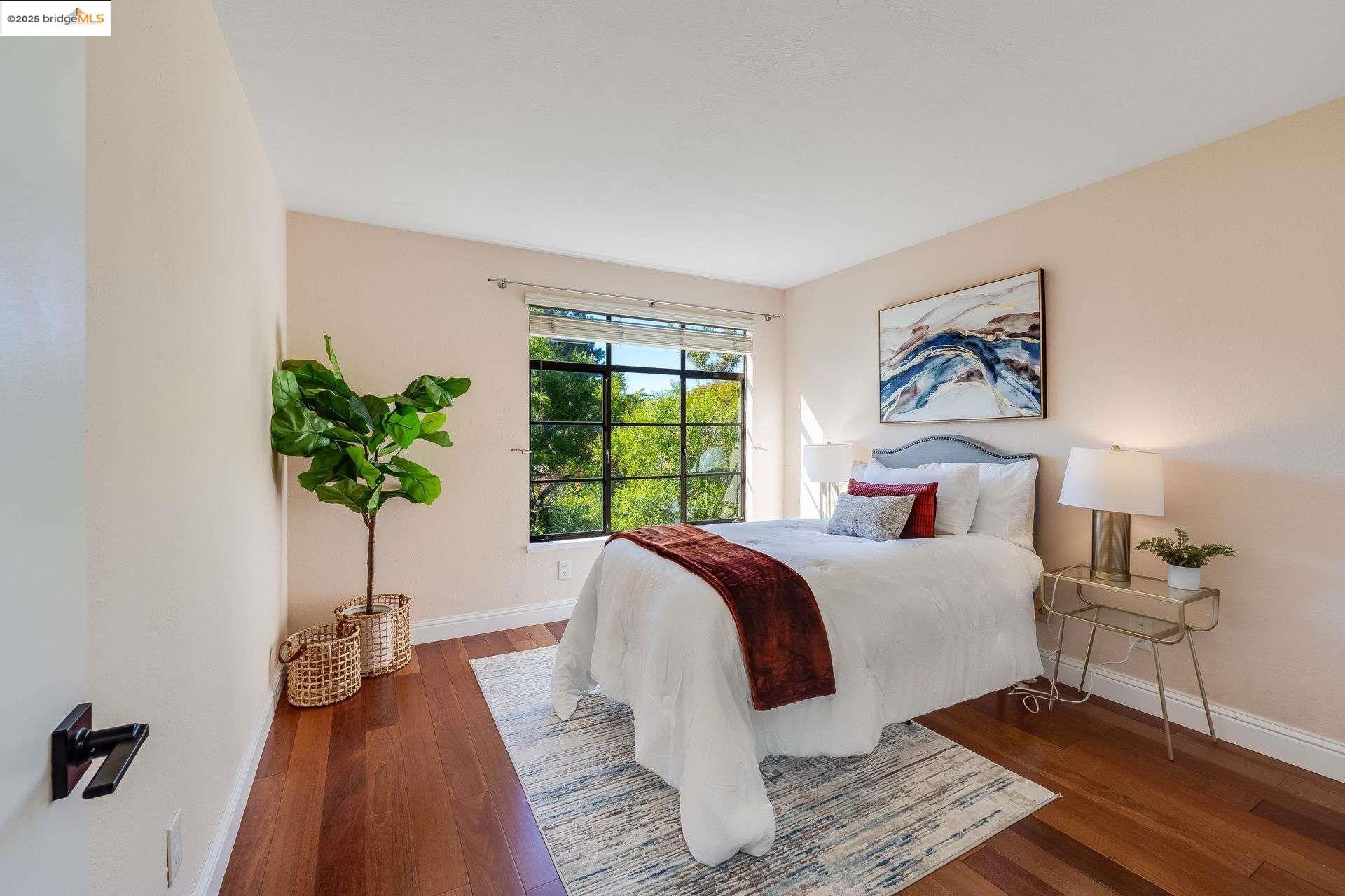 2316 Blake Street, Unit D Berkeley, CA 94704 - Photo 29 of 31 Bedroom featuring dark wood-type flooring and baseboards