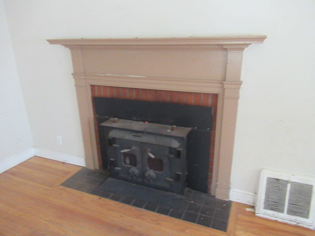 505 South Prospect Avenue Champaign, IL 61820 - Photo 7 of 19 a living room with a fireplace