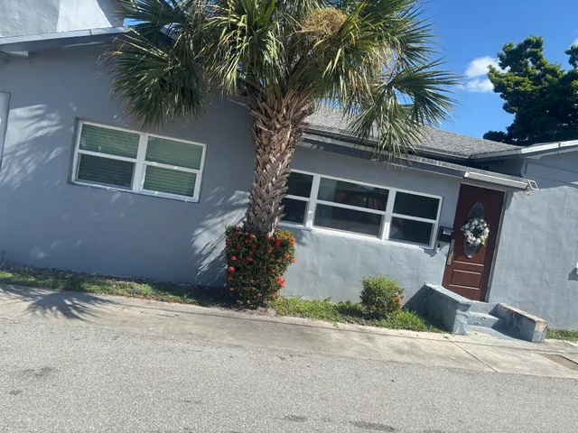 a room with furniture and a rug