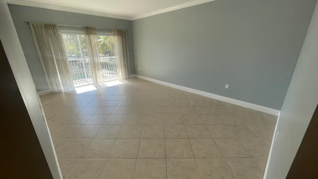 a kitchen with a refrigerator and a stove
