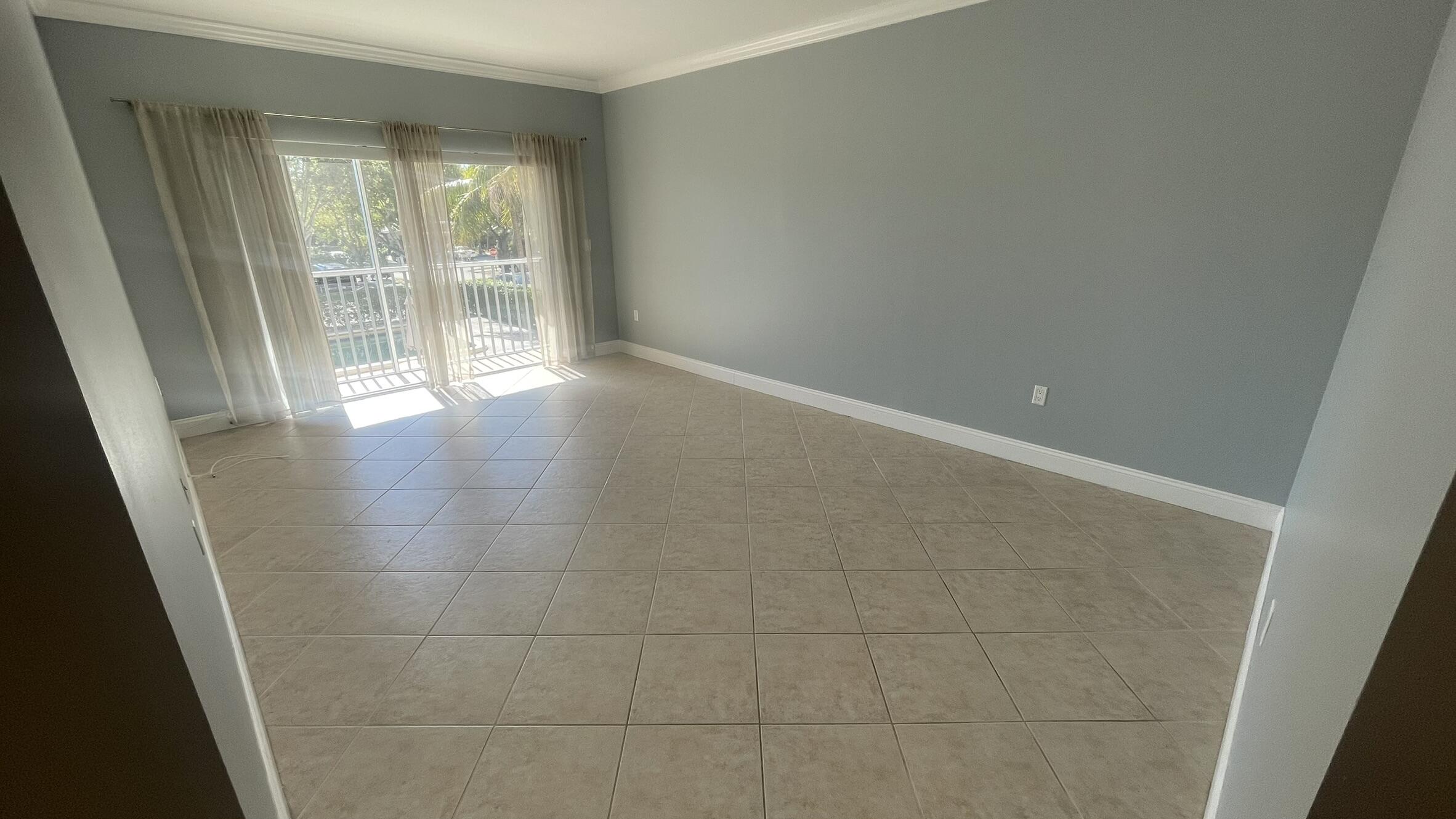 50 Southwest 3rd Avenue, Unit 2010 Boca Raton, FL 33432 - Photo 12 of 22 a view of an empty room with a window