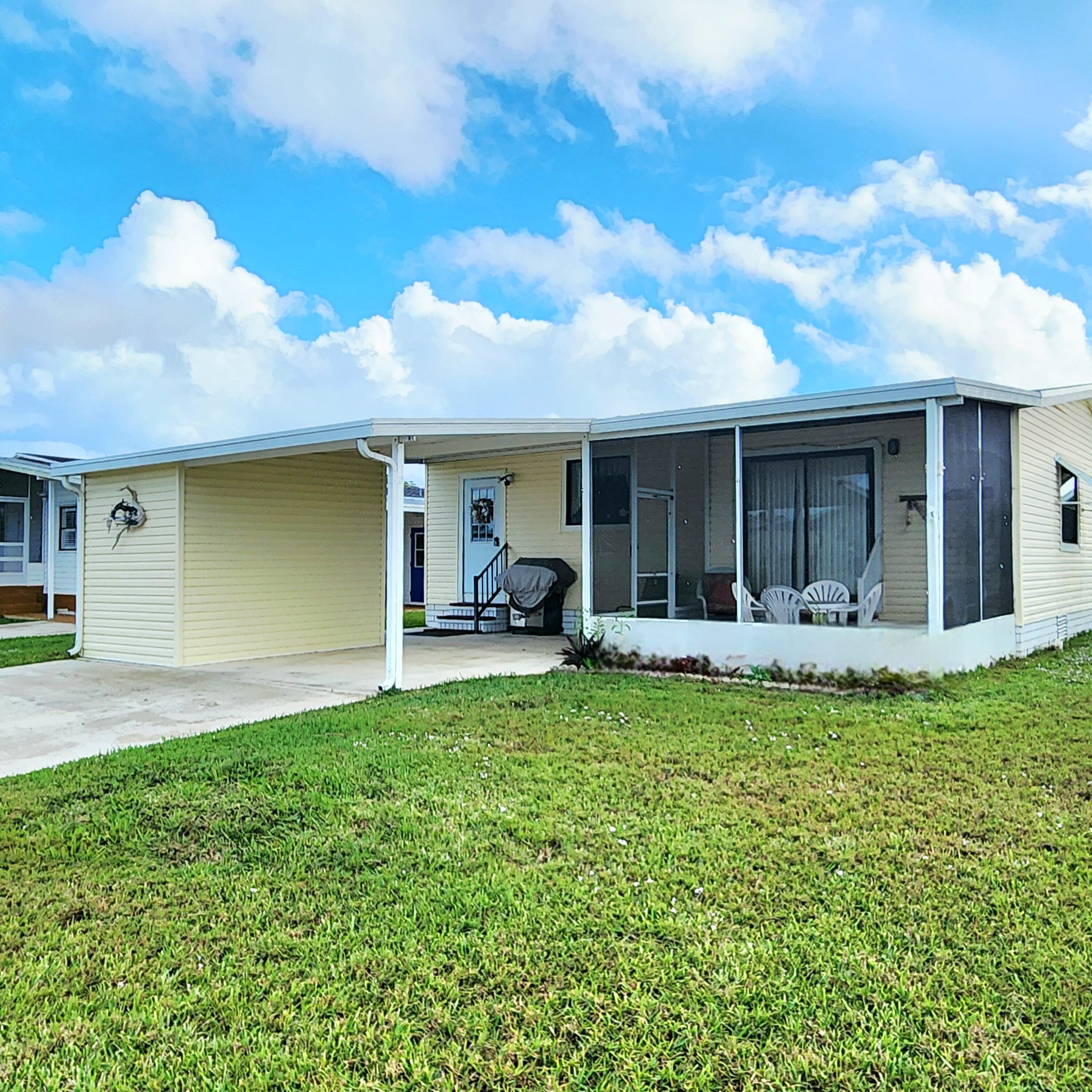a view of a house with backyard porch and porch