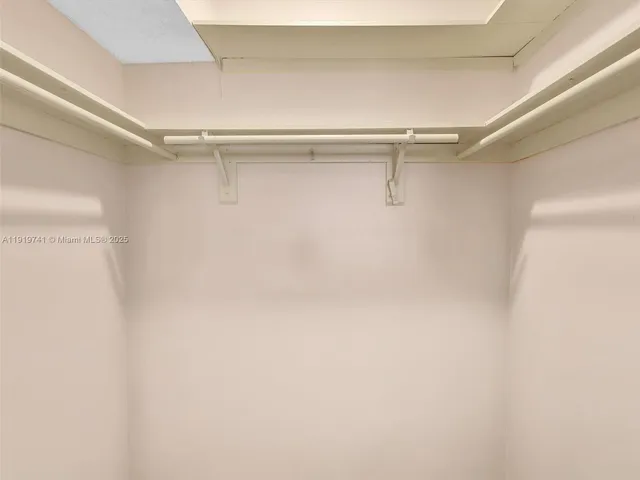 a view of a room with racks on the wall