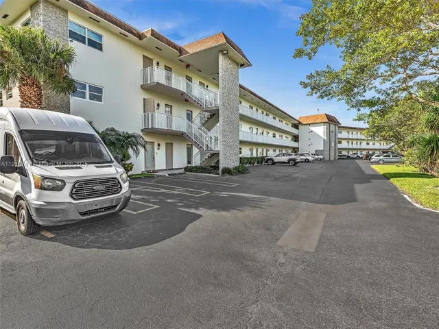 a car parked in front of a building