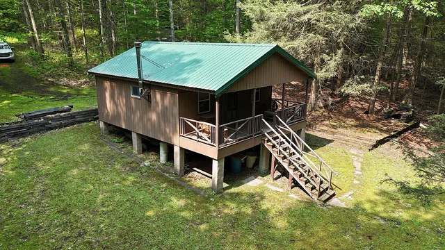 a house with trees in the background