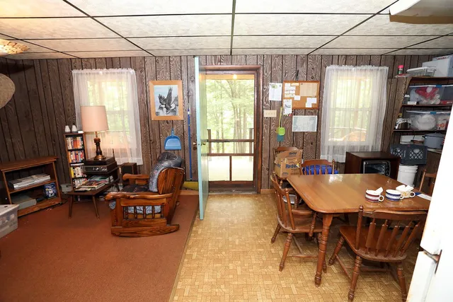 a outdoor dining space with furniture and outdoor view