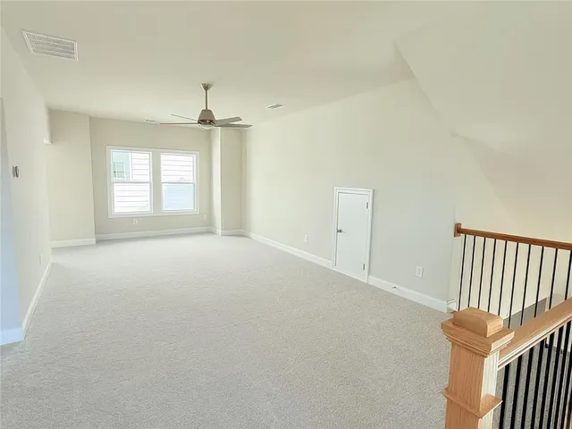 a view of walk in closet with window