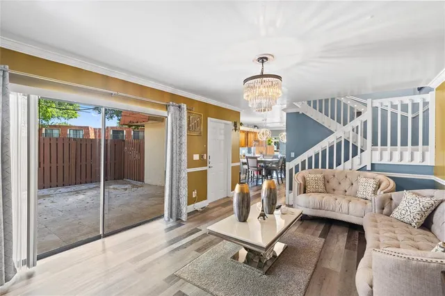a view of living room filled with furniture