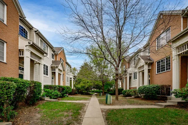 a view of a building with a yard