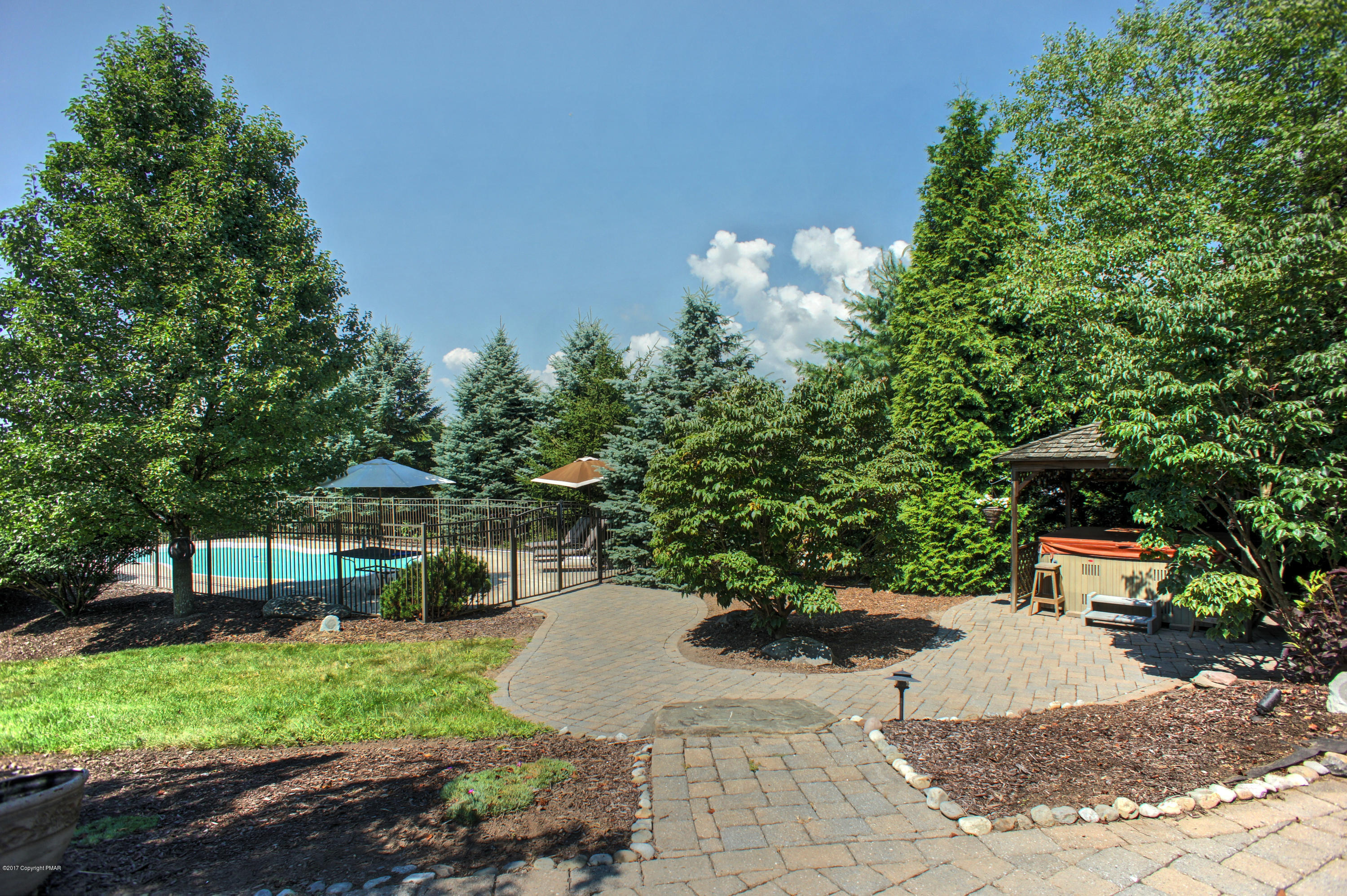 1574 Rachel Road Stroudsburg, PA 18360 - Photo 7 of 58 Pavers Leading To Pool and Hot Tub