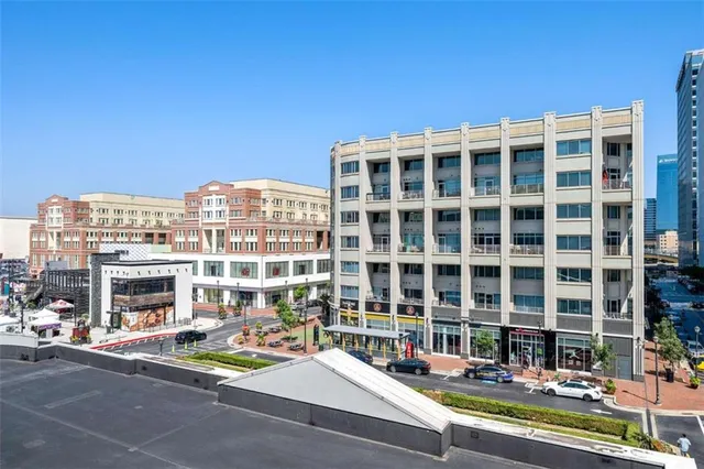 a view of a building with a street
