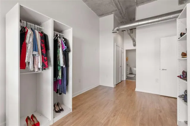 a room with furniture and a book shelf