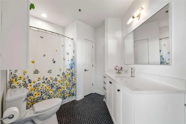 a workspace with furniture and wooden floor